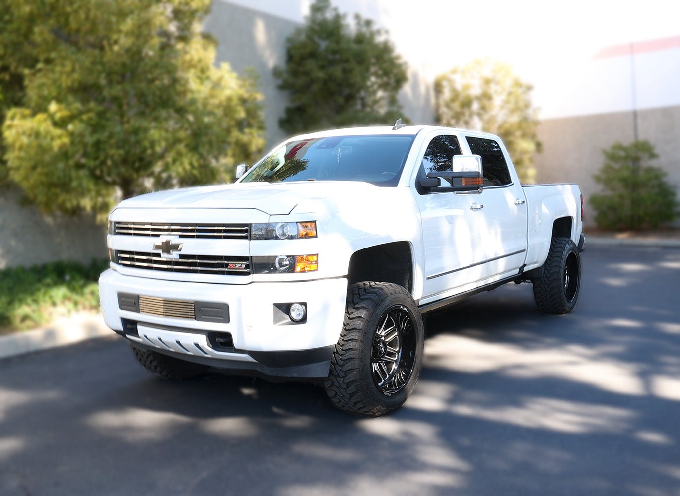 Go Rhino 20405187PC 2015 - 2019 Chevy Silverado 2500/3500 HD E1 Series Electric Running Board Kit - Rugged Truck Gear