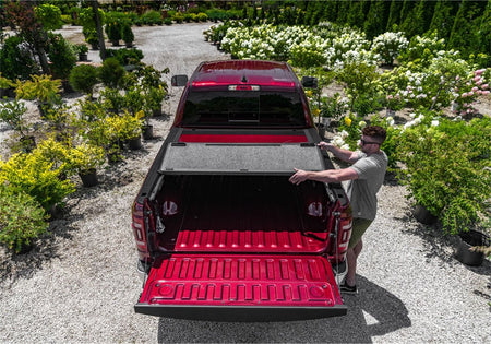 UnderCover Fusion AR32004L - PAU 2010 - 2023 Dodge Ram 2500/3500 Hard Folding Tonneau Cover 8 ft. Bed - Rugged Truck Gear